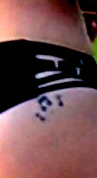 Janel inked three musical notes tattoo on her butt